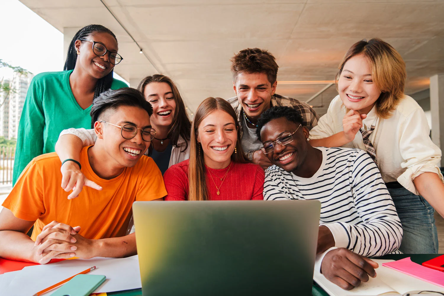 big-group-of-young-students-using-a-laptop-to-do-t-2026-01-08-06-05-50-utc2 (1)